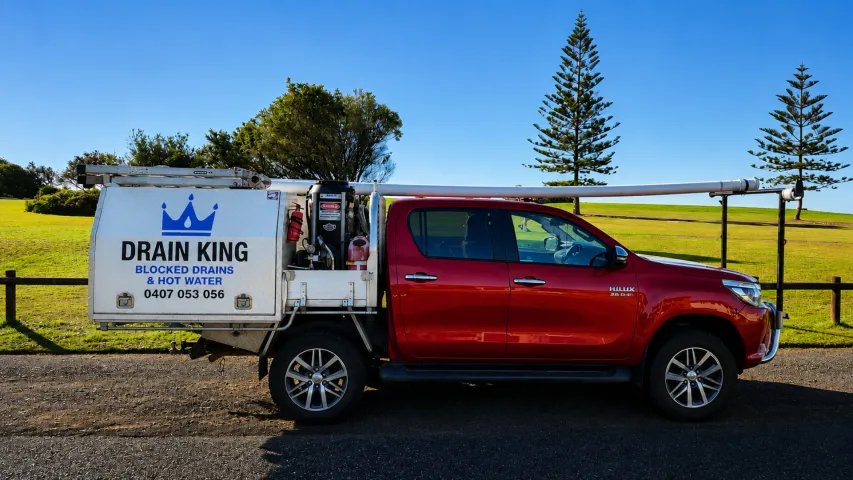 Drain King signed service ute ready for blocked drain and hot water callouts in Forster
